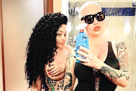 Amber Rose and Blac Chyna display their tattoos in latest selfie