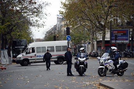 23 in custody as manhunt continues for Paris attackers