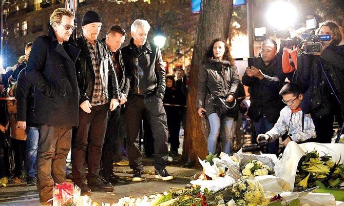 Bono and fellow U2 bandmates honoured the victims of the Paris terror attacks on Saturday