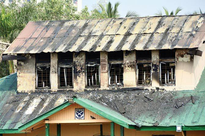 The fire gutted the top floor and roof of the heritage gymkhana building, but in the process of dousing the fire, the newly refurbished ground was also ruined. PICs/BIPIN KOKATE
