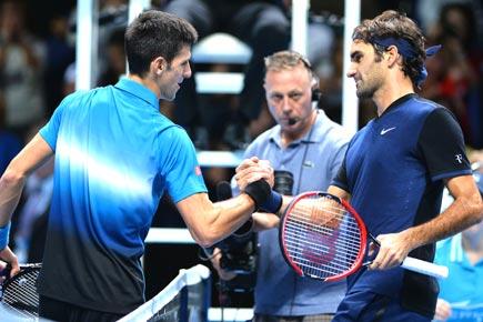 Federer breaks Djokovic's 23-match winning streak at ATP Tour Finals