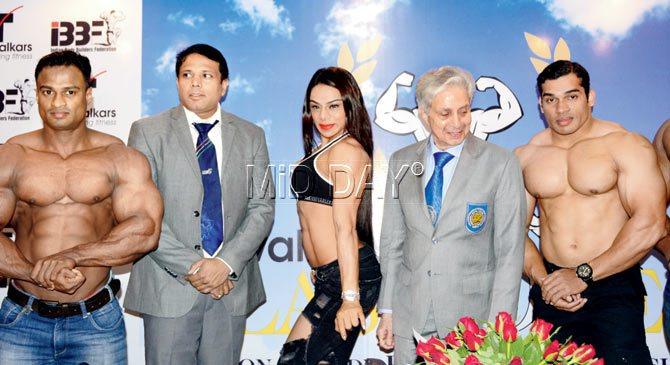 Brawn power: (fourth from left) Madhukar Talwalkar with body builders  at a conference. Pic/BIPIN KOKATE