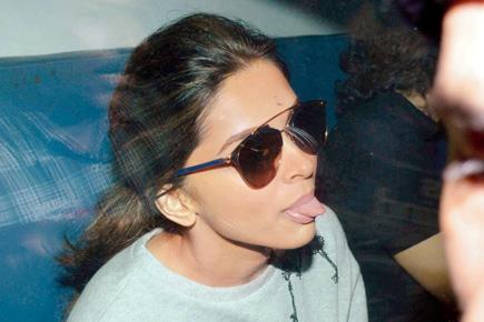 Why is Deepika Padukone sticking her tongue out?