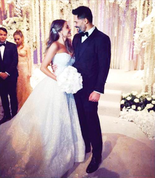 Sofia Vergara and (left) with filmmaker Joe Manganiello. The Modern Family actress opted for a Zuhair Murad gown for the nuptials.