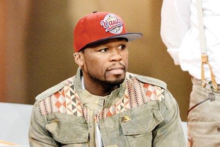 'Bankrupt' rapper 50 Cent keeps his money 'cool'