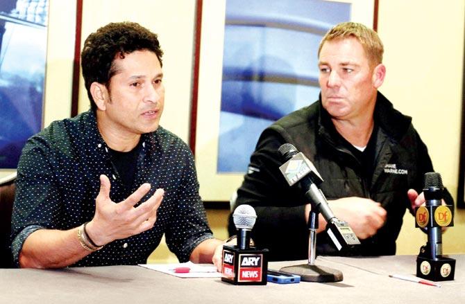 Sachin Tendulkar and Shane Warne talk to the media in New York on Monday. Pic/PTI