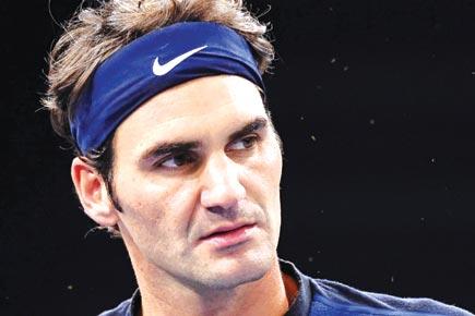 Roger Federer stunned by John Isner in Paris Masters