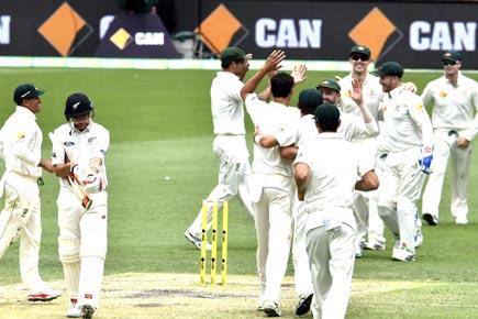 Warner enters record books as Aussies crush Kiwis by 208 runs in first Test