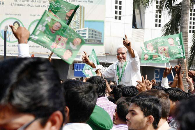 AIMIM supporters celebrate after the KDMC poll results are declared