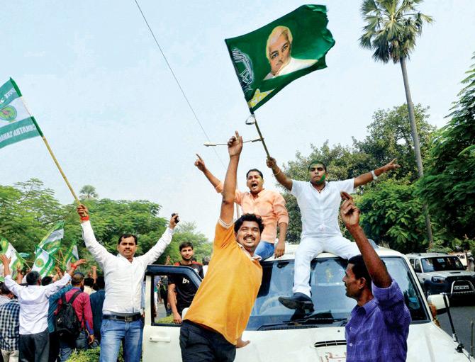PARTY TIME: JD (U) supporters dance as they celebrate the Grand Alliance