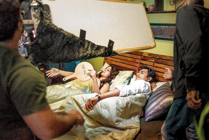 Bipasha Basu and Nawazuddin Siddiqui shoot a bedroom scene in Aatma: “I had some really nice shots of her [Bipasha Basu] in the bath as well, but after a few shots, I was shooed away since she didn’t want anyone to see her either in bed or in the shower.”