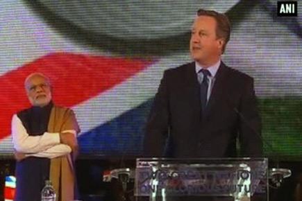 Cameron sings Modi tune, says 'ache din zaroor aayega'