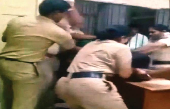 In the clip, at least five cops can be seen dragging the couple apart and assaulting the boy, as the girl begs for mercy