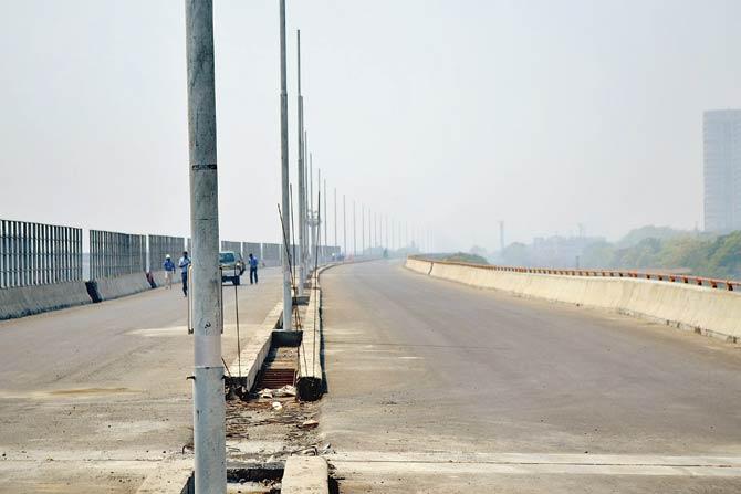 In the past, the MMRDA has agreed to install view-cutters on some of its projects, such as this stretch of the Eastern Freeway passing by oil depots in the Wadala-Sewri complex