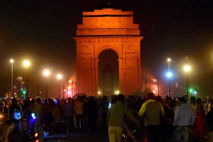 India Gate lights up in orange for UN's violence against women campaign