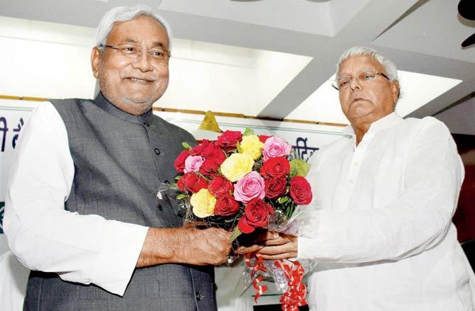 Nitish Kumar and Lalu Prasad Yadav. Pic/AP