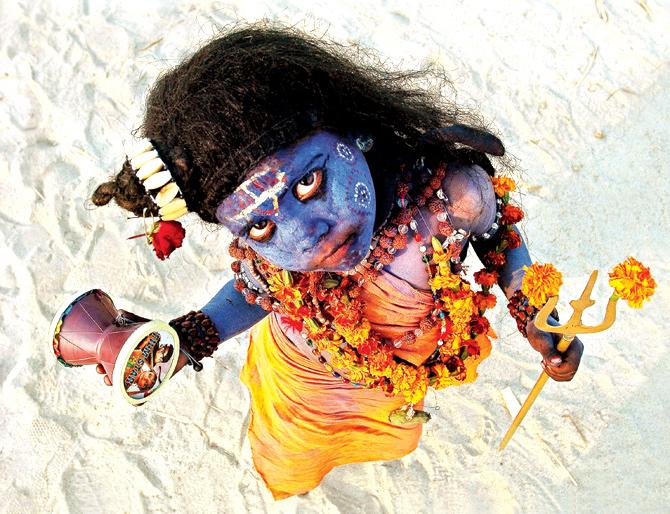 A boy dressed as Shiva at the Ardh Kumbh Mela in Allahabad