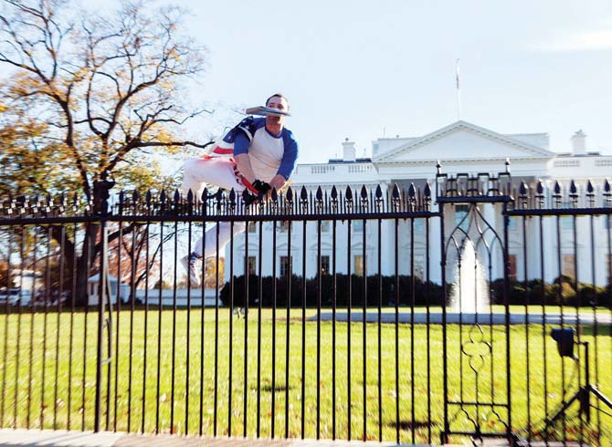 A bystander snapped pics of Caputo as he jumped the fence. Pic/PTI