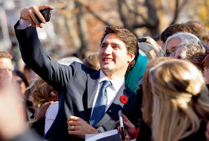 Trudeau takes a selfie after the  swearing-in ceremony. Pic/AFP