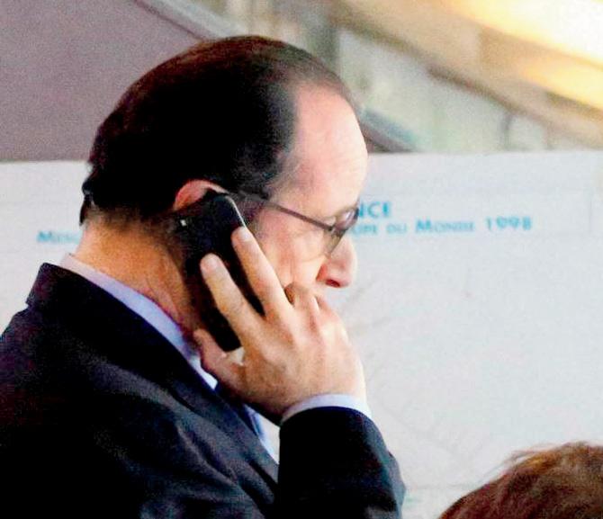 France’s President Francois Hollande is pictured in the security control room at the Stade de France stadium during the international friendly soccer match between France and Germany. Pic/PTI