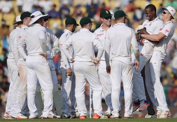 South African cricket team celebrate a wicket