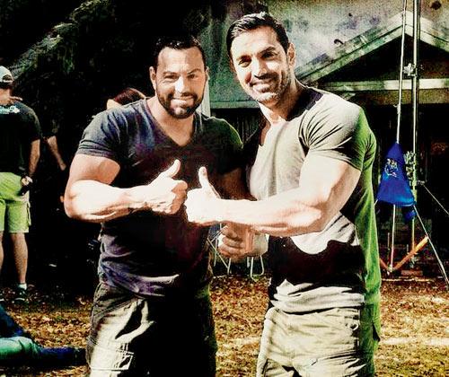 John Abraham with professional stunt performer Darrell McLean on the set of Force 2 in Budapest