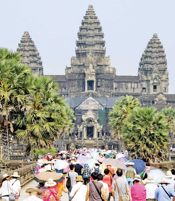 Three largest sources of foreign tourists to the Angkor Wat temple  are from China, South Korea and Japan. Pic/AFP