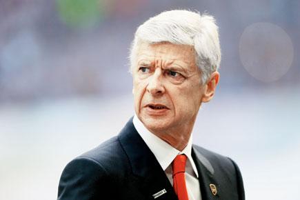Arsene Wenger threatens to walk out of a press conference