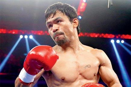 Pacquiao to hang gloves on legendary career after Bradley bout