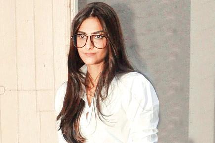 Is Sonam Kapoor bored or tired?