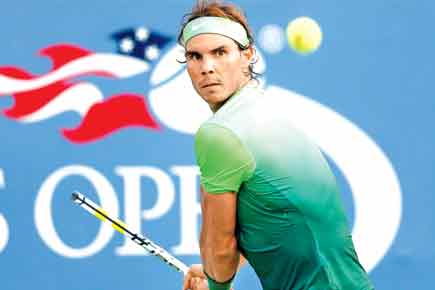 Shanghai Masters: Nadal wins thriller as Karlovic ace machine jams