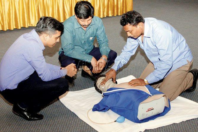 BREATH CHECK: A paramedical instructor guides ambulance drivers on administering emergency procedures at Nanavati Hospital. PIC/TUSHAR SATAM
