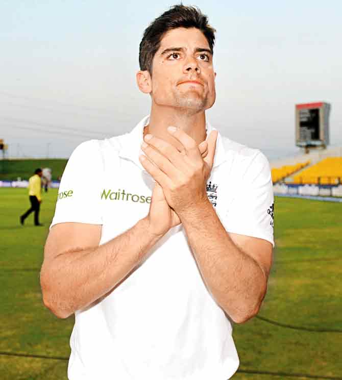 England captain Alastair Cook applauds the crowd after the first Test against Pakistan ends in a draw at Zayed Cricket Stadium, Abu Dhabi on Saturday. Pic/Getty Images