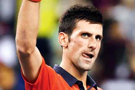 Novak Djokovic mauls Andy Murray 6-1, 6-3