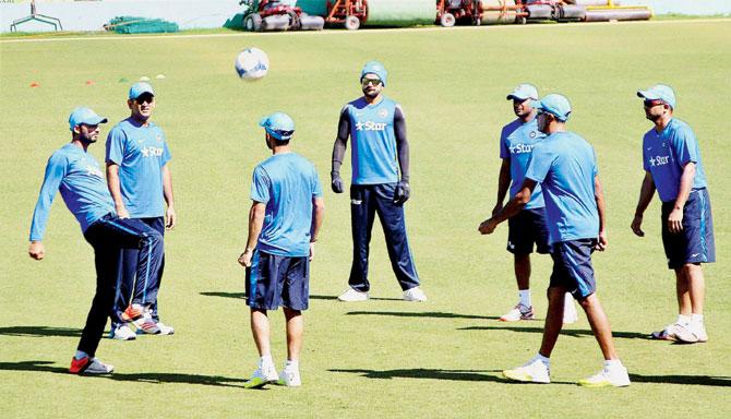 India players play football during a practice session in Dharamsala yesterday. Pics/PTI