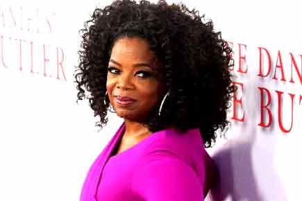 Oprah Winfrey takes African students to see 'The Color Purple'