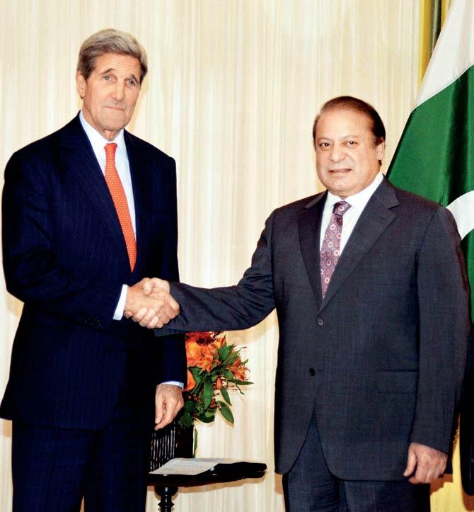 Pakistan Prime Minister Nawaz Sharif and US Secretary of State John Kerry in a meeting in Washington on Wednesday. Pic/PTI