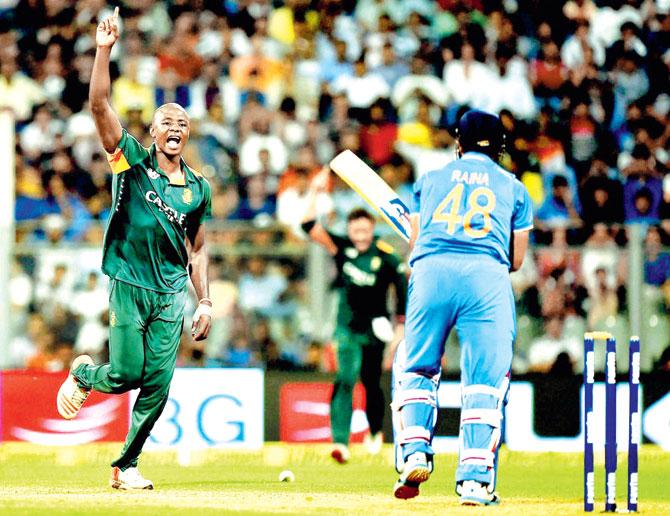 South Africa pacer Kagiso Rabada celebrates the wicket of Suresh Raina at Wankhede Stadium on Sunday. Pic/PTI