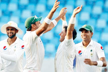 Pakistan bowlers overcome English resistance to win first Test