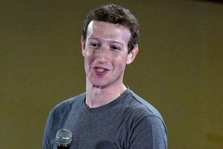 Facebook CEO pledges to give away 99 percent of company shares