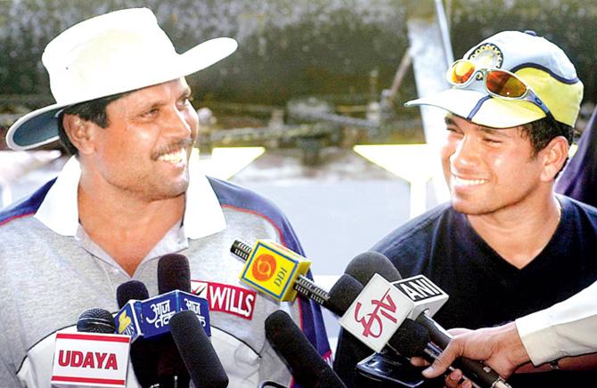 Way back then: India coach Kapil Dev and skipper Sachin Tendulkar during a press conference prior to the second Test against South Africa in Bangalore on March 1, 2000. Pic/AFP 