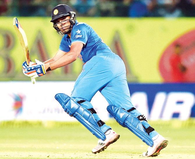Centurion Rohit Sharma in full flow against SA in Dharamsala on Friday. Pic/AFP