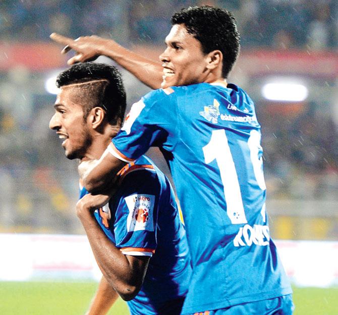 Romeo Fernandes (right) and Raju Gaikwad celebrate FC Goa