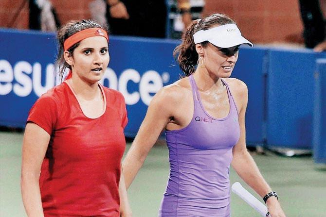 Sania Mirza and Martina Hingis. Pic/PTI