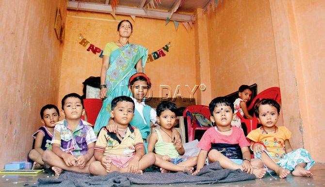A resident conducts an Aanganwadi class in the neighbourhood every day