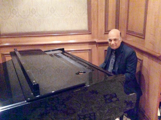 Austen Alphonso has been the pianist at the Zodiac Grill for 26 years