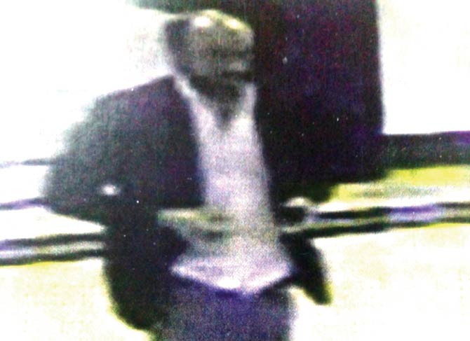 CCTV captured this indistinct image of the thief, who was dressed in a blazer