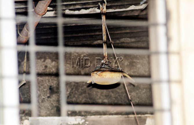 The fan still hangs in the charred Family Room on the mezzanine level of City Kinara in Kurla where eight people lost their lives. Pic/Sameer Markande