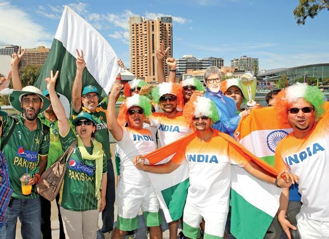 India and Pakistan cricket fans pose with their flags outside Adelaide Oval ground in Australia during a 2015 World Cup match on February 15, 2015.  Cricket lovers on both sides of the border would miss an exciting series due to politics, which should be kept away from sports in principle. Pic/Getty ImagesIndia and Pakistan  cricket fans pose with their flags outside Adelaide Oval ground in Australia during a 2015 World Cup match on February 15, 2015.  Cricket lovers on both sides of the border would miss an exciting series due to politics, which should be kept away from sports in principle. Pic/Getty Images