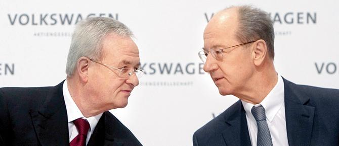 A file pic from March 2014 shows Martin Winterkorn (L) then CEO of Volkswagen, and Volkswagen CFO Hans Dieter Poetsch. Poetsch will be proposed to take over as supervisory board chief 